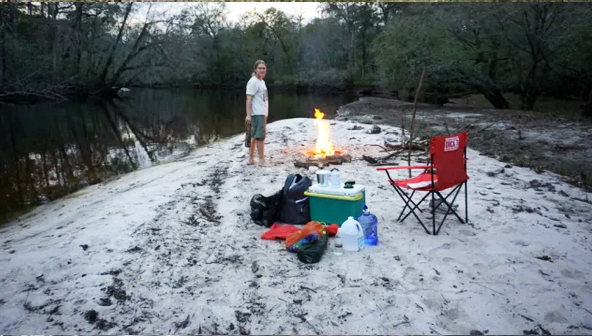 setting up camp on the river