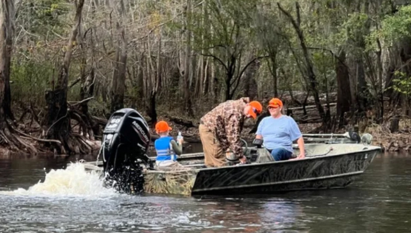 a family stuck on the river