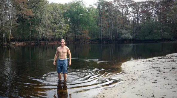 wading into the river